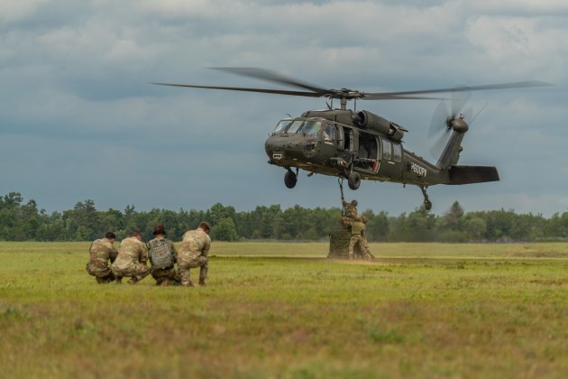 US Army National Guard Sgt. uses a tablet to command the Sikorsky OPV Black Hawk to autonomously transport a 2,900-pound water buffalo sling load for the first time during Northern Strike in Michigan.

Credit: Sikorsky