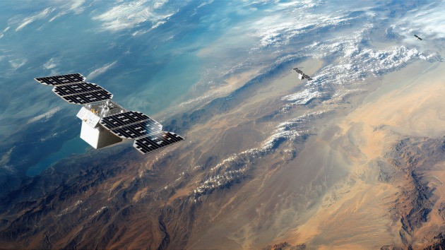 A rendering of Planet&rsquo;s next-generation monitoring spacecraft Owl&trade; over the desert.