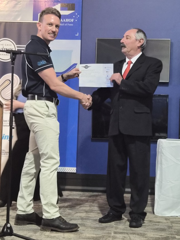 Phil Unicomb is delighted to receive the Col Pay Award for Services to GA