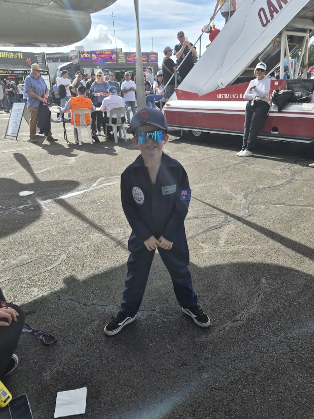 Young aviation enthusiast Felix Yuide arrives dressed for the job