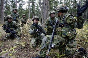 Abe secures reform to allow Japanese troops to fight overseas 