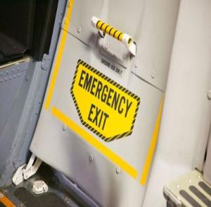 Plane passengers open emergency exits for fresh air