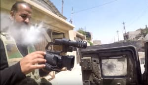 Watch: GoPro deflects ISIS sniper bullet, saves journalist's life