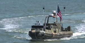 Robotic patrol boats to counter swarms